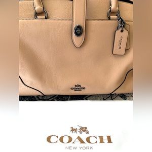 Brand new, ballet-pink/nude, never used Coach purse